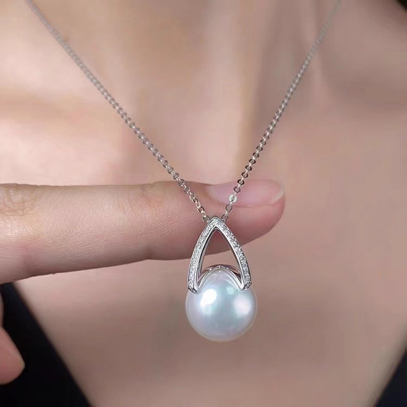 How to Style a Single Pearl Pendant